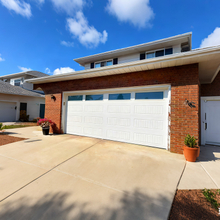 White Residential Insulated Electric Garage Doors