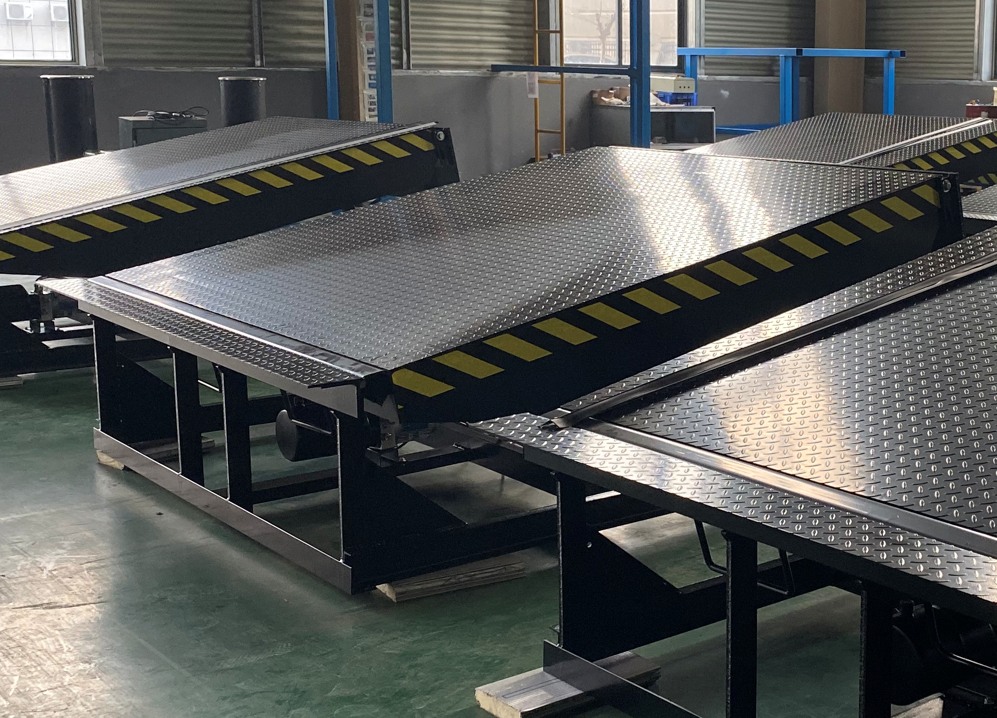 What is a loading dock leveler?